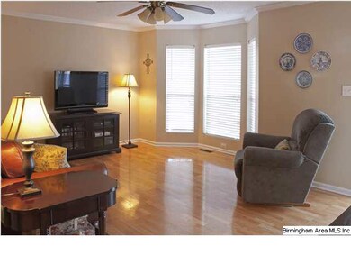 Family room with spacious bay window.