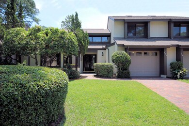 Front elevation showing paver driveway