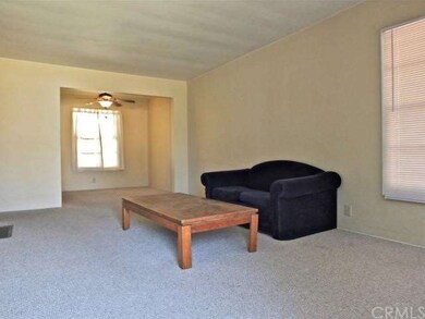 View of Living Room & Formal Dining From Front Doo