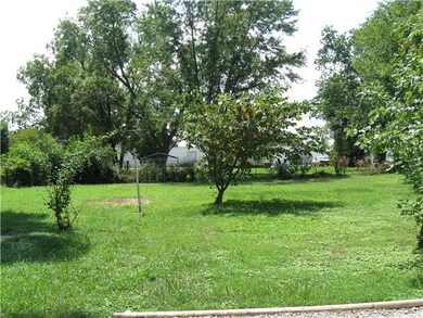 The large backyard will be the perfect place for children to play or for your garden.