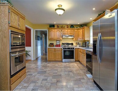 Kitchen is 18X12 = Spacious for the cook in the family!  Stainless steel gas stove with single oven, plus additional built in oven and microwave - Appliances are 6 years old