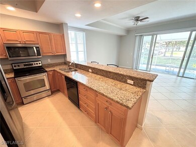 Kitchen with a sink, a wealth of natural light, a