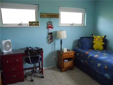 Bedroom. The 2nd bedroom, again, has many windows,