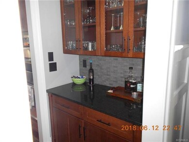 Butler's Pantry.  Double door pantry on opposite s