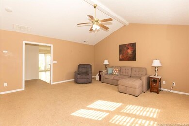 Living room has vaulted ceiling!