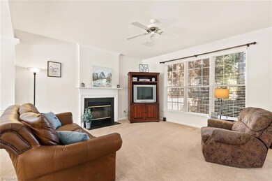 Living room with wood burning fireplace