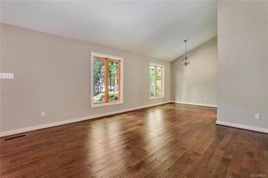 Hardwood Floors / Vaulted Ceilings in Living Room 