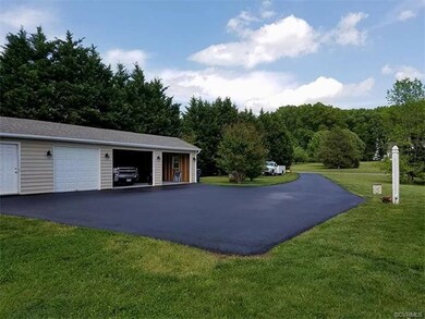 Paved drive lots conifers for your privacy!