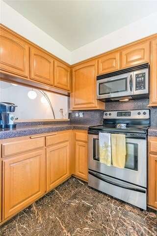Kitchen with pass through to the breakfast bar and