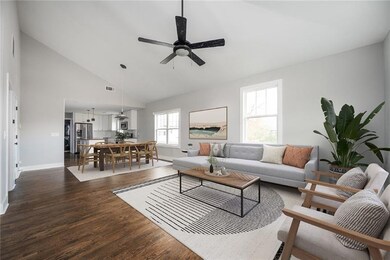 Living room featuring dark hardwood / wood-style f