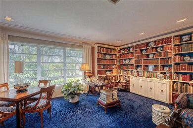 An abundance of natural light in library / living