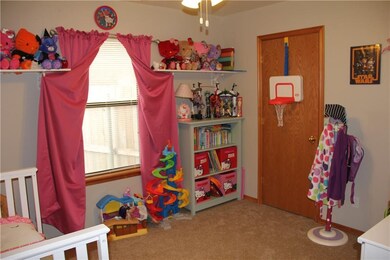 Bedroom with walk-in closet