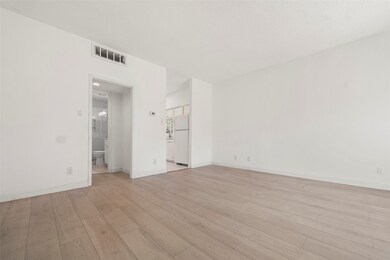 Bright and inviting living room view from the entr