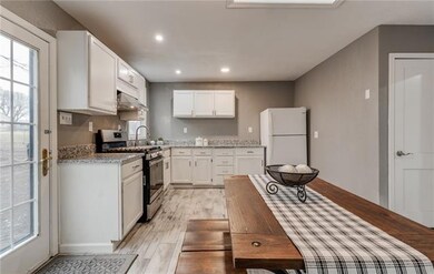 Fridge stays! Door to basement off the kitchen