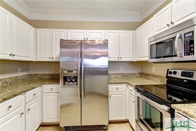 Kitchen with granite counters and stainless steel 