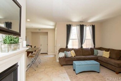Fireplace off of the family room and large windows
