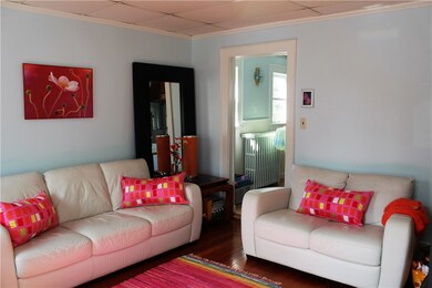 Lvrm with Cast iron Stove off the kitchen