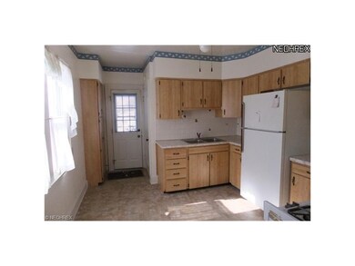 Remodeled kitchen with small eat in area. Nice windows for fresh air and plenty of light. New flooring