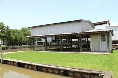 Boat House + Full Bath + Storage Shed