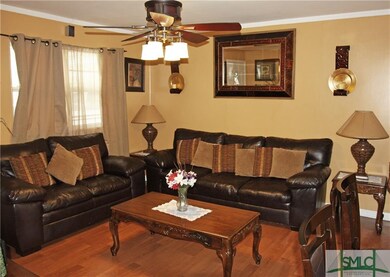 Cozy Living Room. Laminate Wood Flooring.