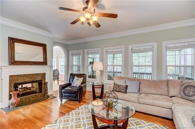 Great room opens to kitchen with see-through firep