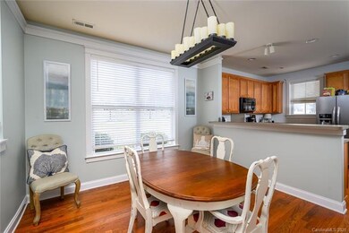 Another angel of dining room, showing the breakfast bar, if one wanted to add stools/chairs.