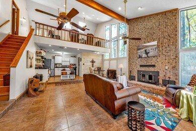 Living room with a healthy amount of sunlight, a f