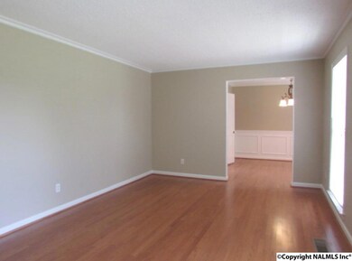 The bonus/flex room offers extra living space. Features beautiful hardwoods, crown moulding and lots of windows.