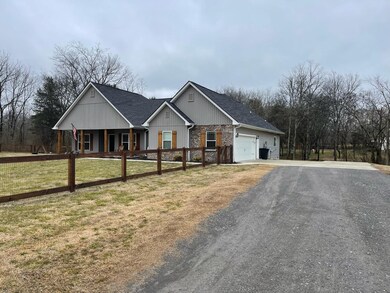 Your new home sets back off the road for your own peace and quiet!