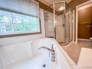 Bathroom featuring tile patterned flooring and ind