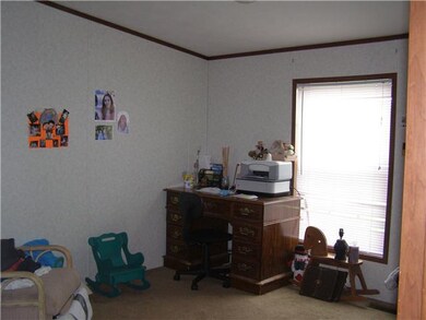 Exterior Front. Additional bedroom or home office.