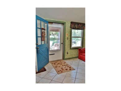 Enclosed Lanai with ceramic flooring, Adjacent to the Kitchen