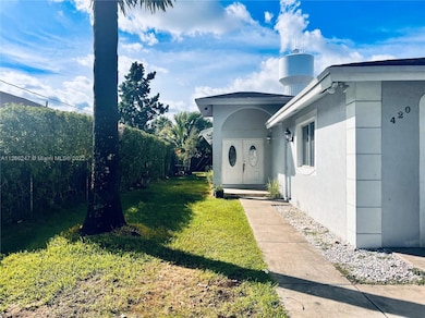 Side yard allows access for boat to RV entry. 