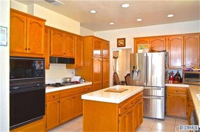 Kitchen featuring lots of storage and recessed lig