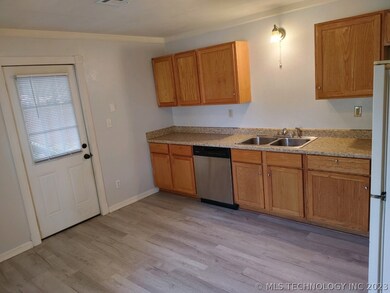 Kitchen door to carport area.
