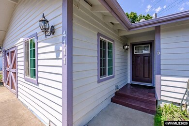 Covered front porch begins your journey into this 