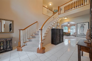 A Grand Entrance, foyer with ceilings that extend