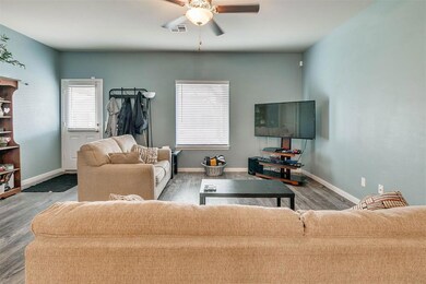 Living room featuring hardwood / wood-style floors