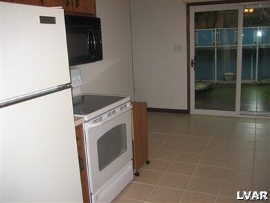 Note the new tile floor and the sliding glass door
