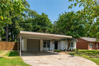 2 Car carport and a garage can accommodate 3 cars.