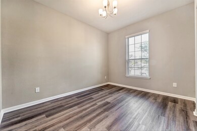 This room features a neutral color palette with fr