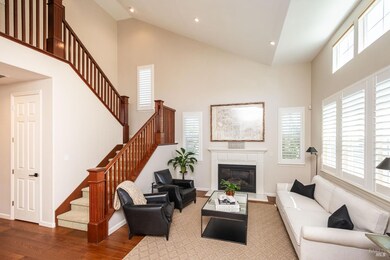 Step inside to a grand foyer that opens into expan