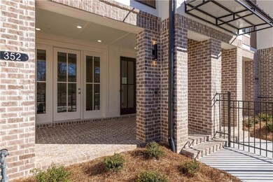 Covered front terrace- perfect space to relax, wor