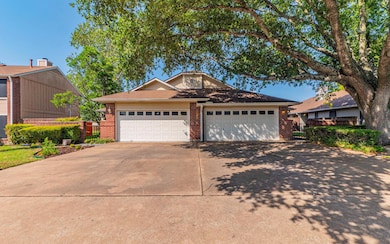 View of front of house featuring brick siding, co