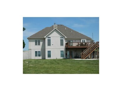 Rear View of 1 1/2 Story with Walkout Basement, De