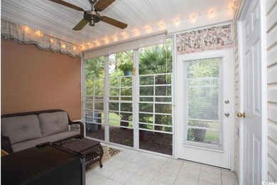 Sunroom featuring plenty of natural light and ceil