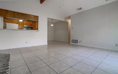 Unfurnished living room with light tile patterned