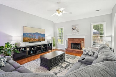 Living area featuring wood finished floors, ceilin