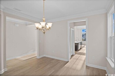 Unfurnished dining area with a chandelier, light h