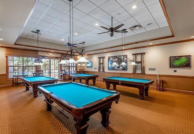 Aerial view of clubhouse 3 pools, etc